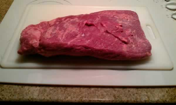 Trimmed brisket ready for smoker