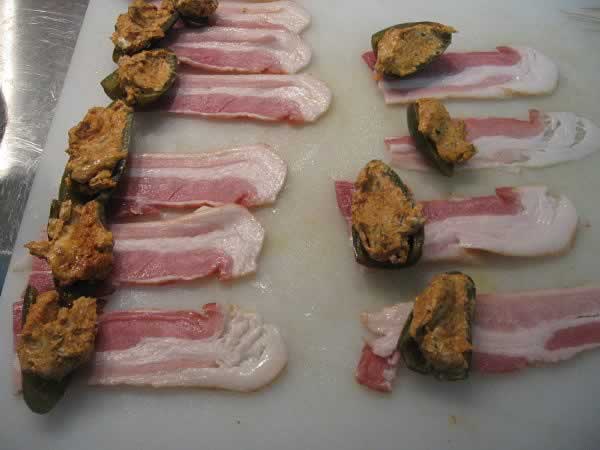 Wrap each jalapeno popper in bacon